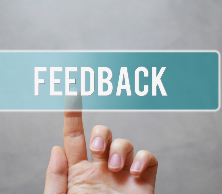 hand points to feedback